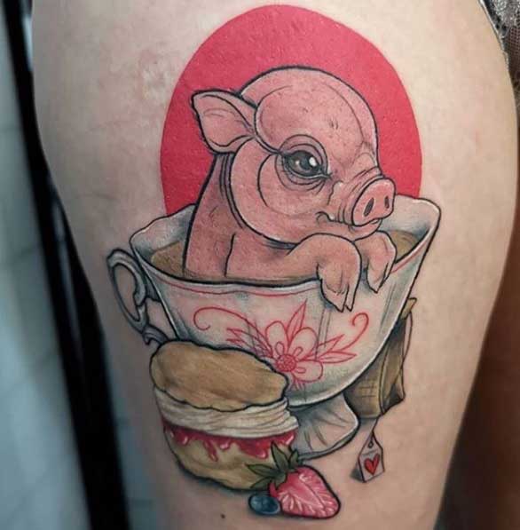 Pig tattoo on the shin for men