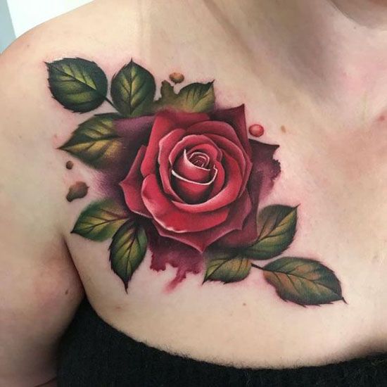 Large rose tattoo on the collarbone for women