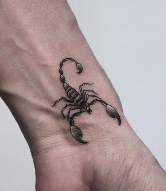 Scorpion tattoo on the wrist for men