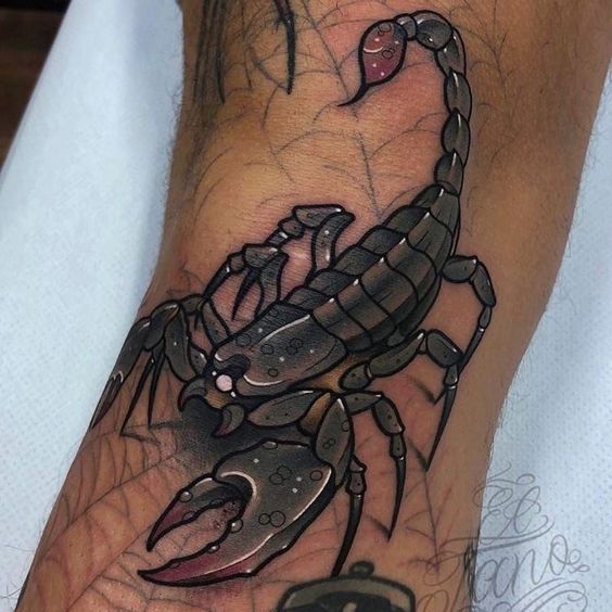 Tattoo of a scorpion on an ankle for women