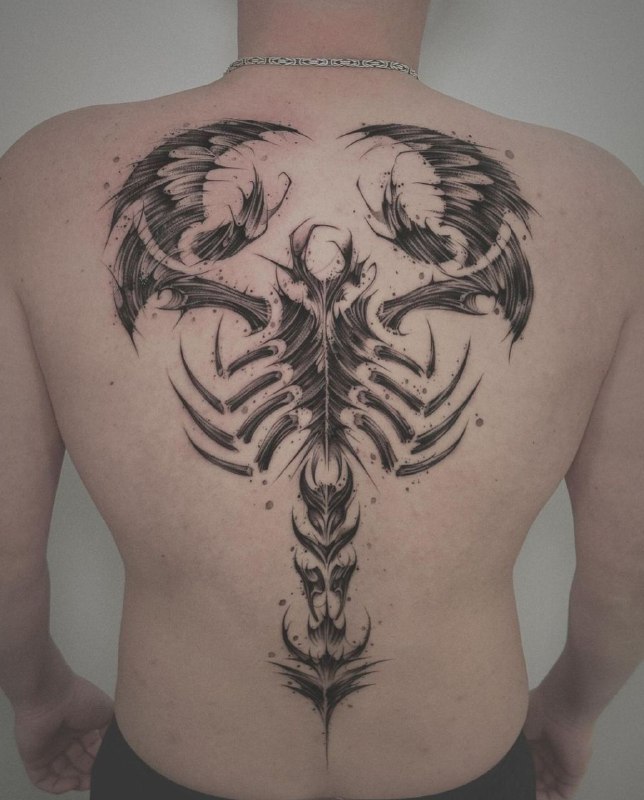 Scorpion tattoo on the back for men