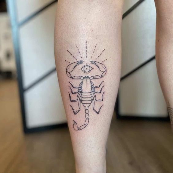 Scorpion tattoo on the calf for women