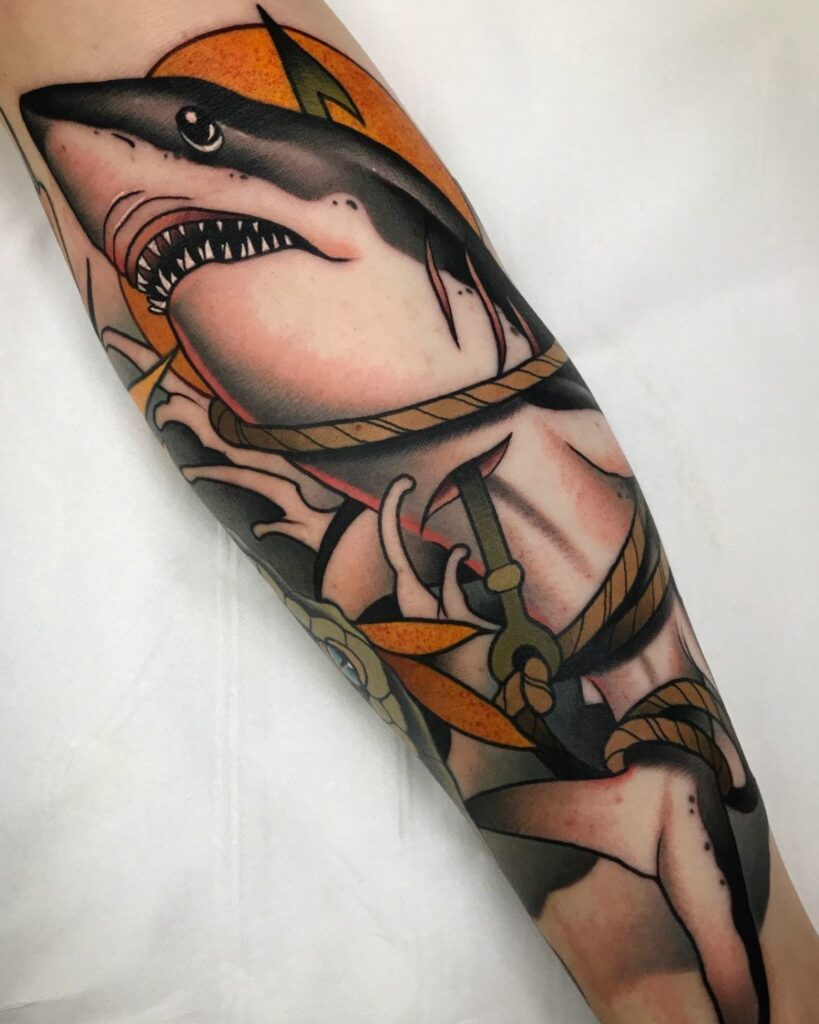 Colored shark tattoo on the arm for men