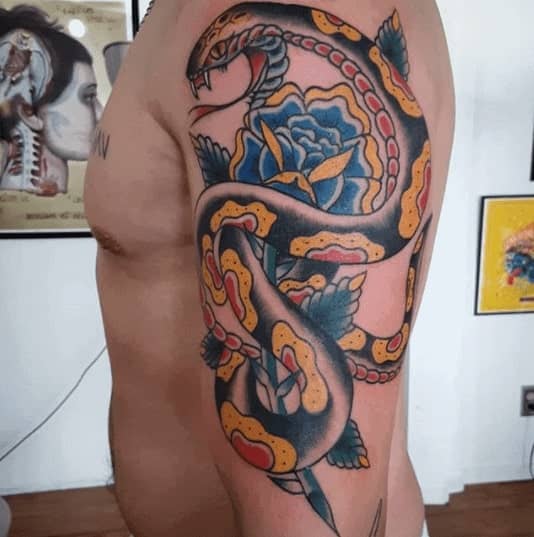 Snake tattoo on the shoulder for men