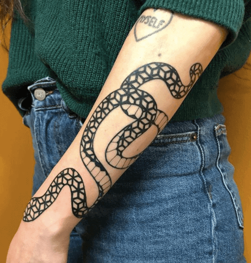 Snake tattoo on the forearm for men