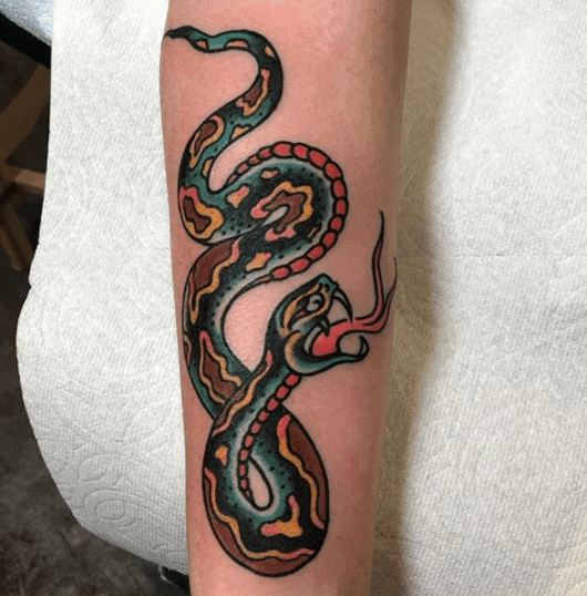 Snake tattoo on the forearm for men