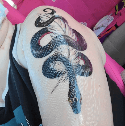 Crowley snake tattoo on the shoulder for men