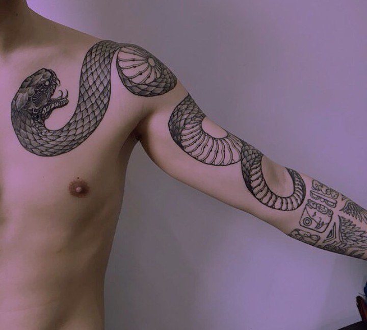 Snake tattoo on the shoulder for men