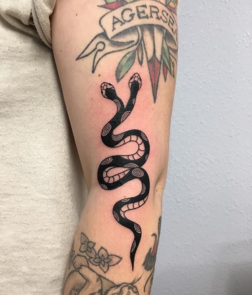 Snake tattoo on the shoulder for men