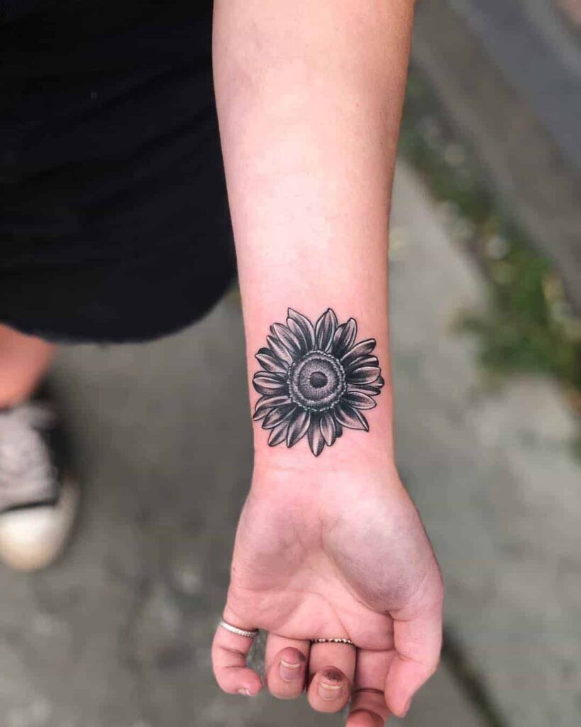 Sunflower tattoo on the wrist for women