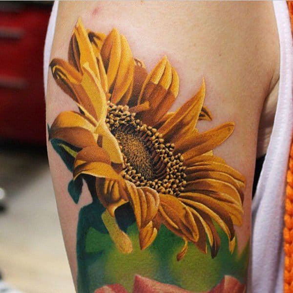 Colorful sunflower tattoo on the shoulder for women