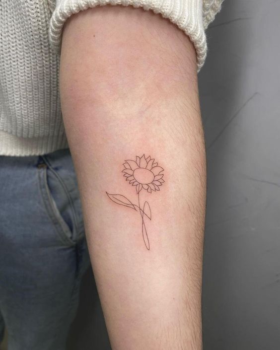 Sunflower tattoo on the forearm for women