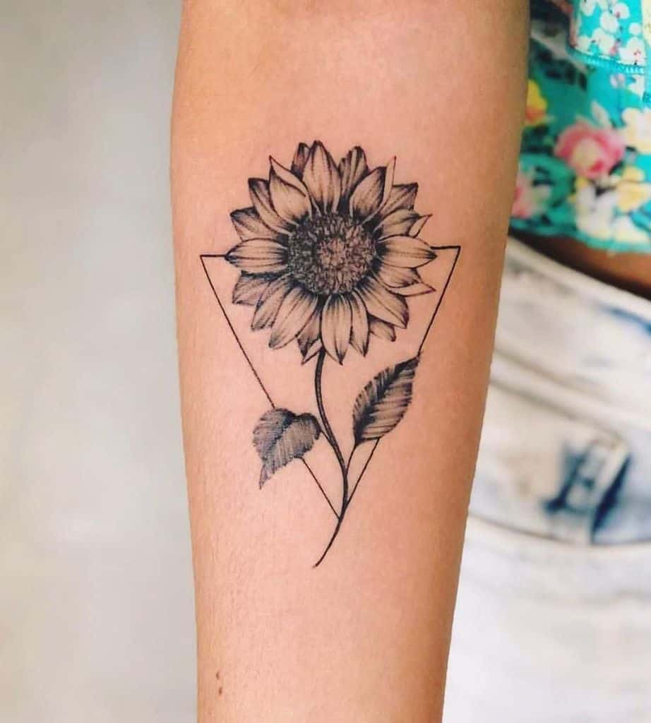 Sunflower tattoo on the forearm for women