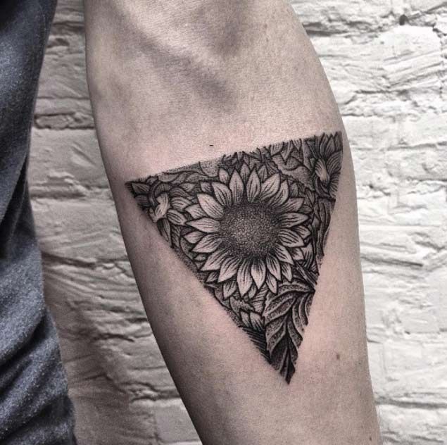 Sunflower tattoo on the forearm for men