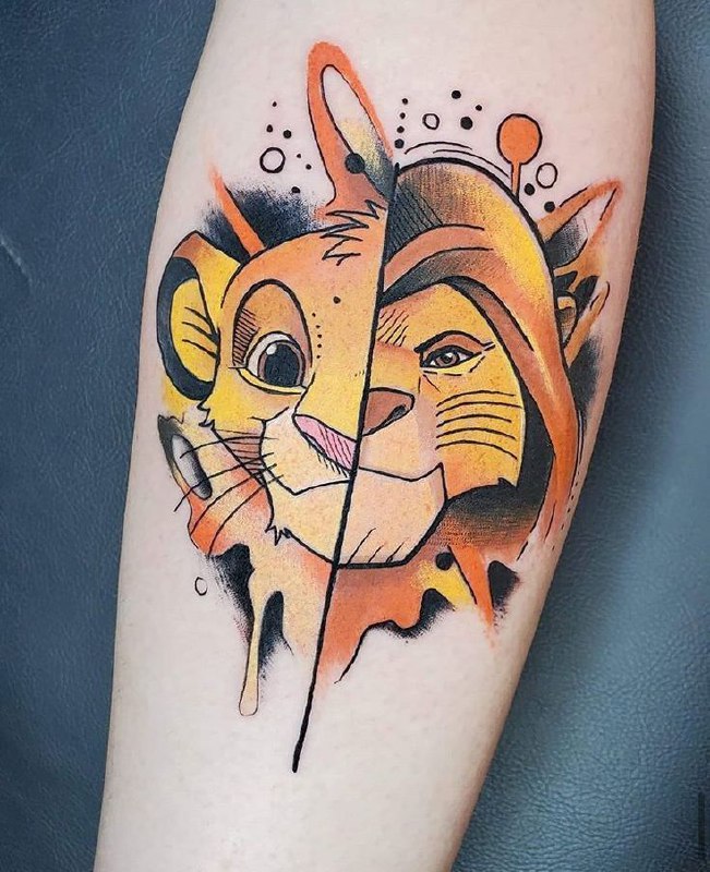 Tattoo of a colored lion on the forearm for women