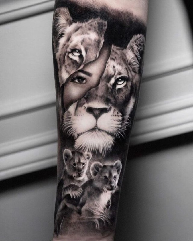 Tattoo of three lions on the forearm for women