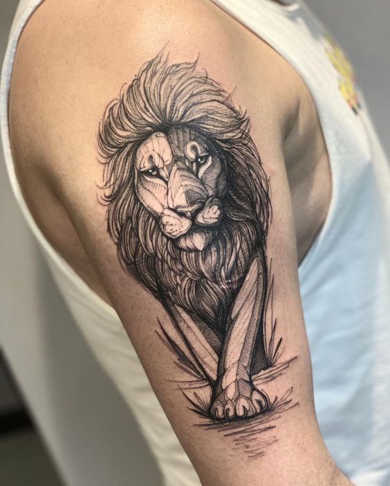 Tattoo of a lion on the shoulder for men