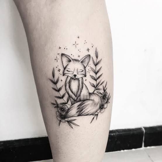 Fox tattoo on the calf for women