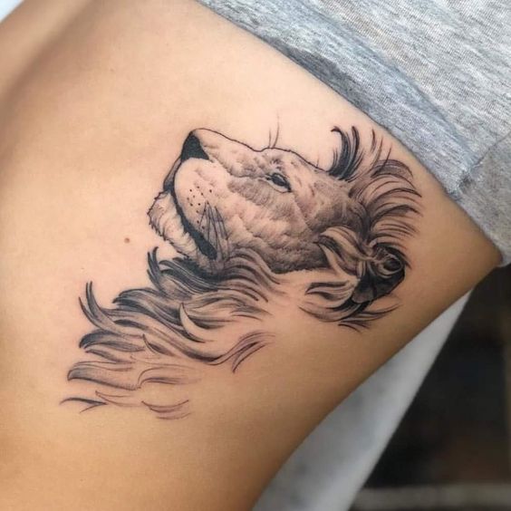 Tattoo of a lion on the side for women