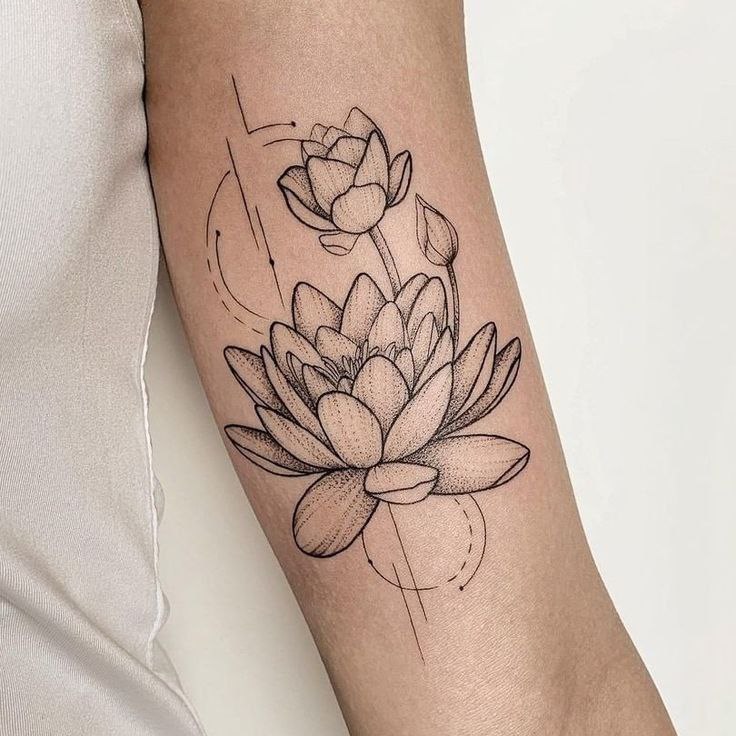 Lotus tattoo on the shoulder for women