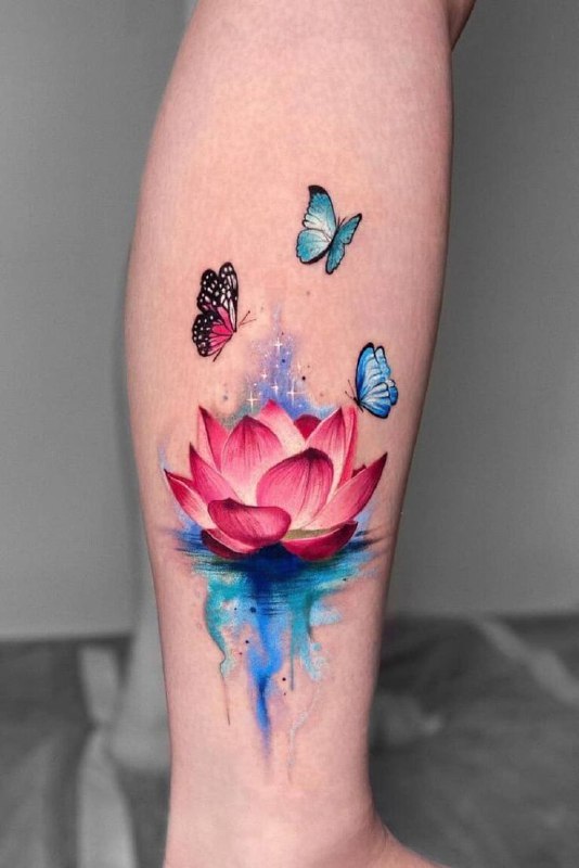 Colorful lotus and butterflies tattoo on the shin for women