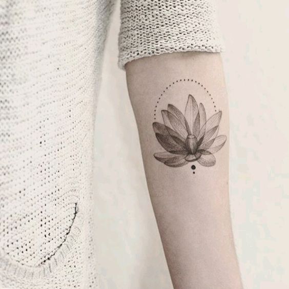 Lotus tattoo on forearm for women