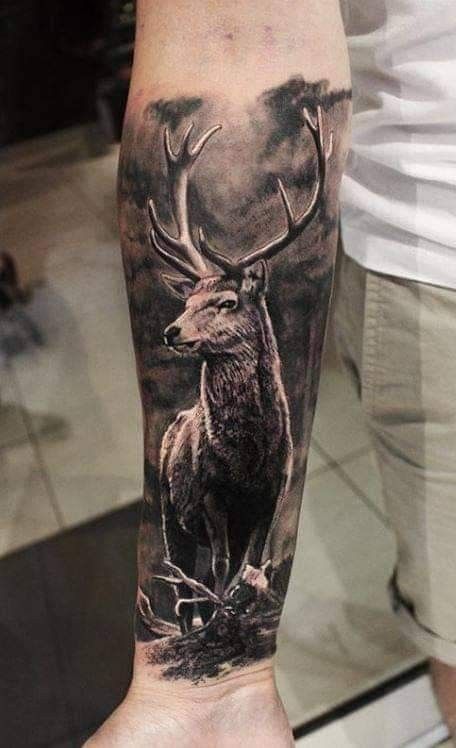 Tattoo of a deer on the forearm for men