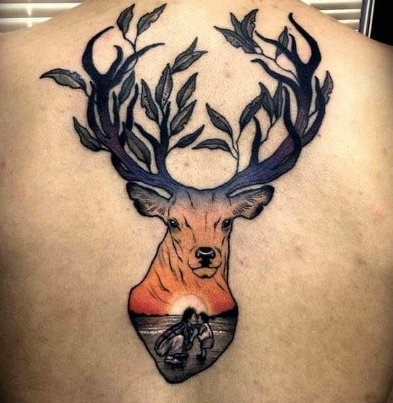 Color deer tattoo on the back for men