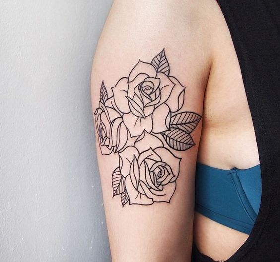 Rose tattoo on the shoulder for women