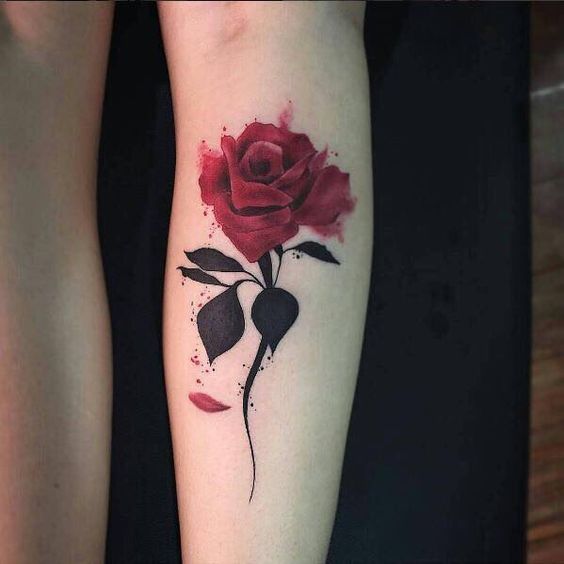 Color rose tattoo on the calf for women