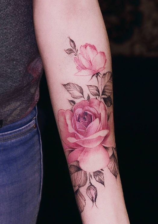 Colorful rose tattoo on the forearm for women