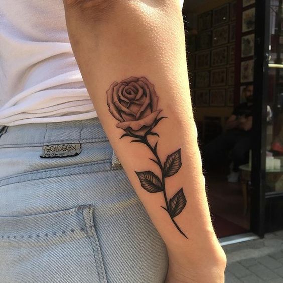 Rose tattoo on forearm for women