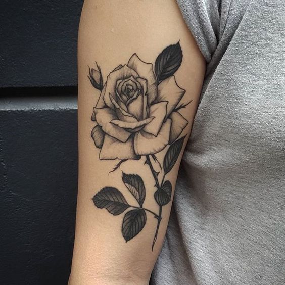 Large rose tattoo on the shoulder for women