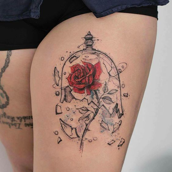 Color tattoo of a rose in a flask on the thigh for women