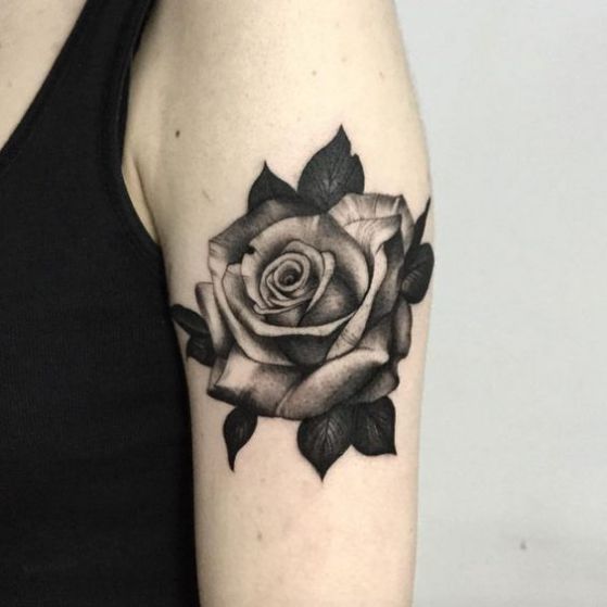 Large rose tattoo on the shoulder for men