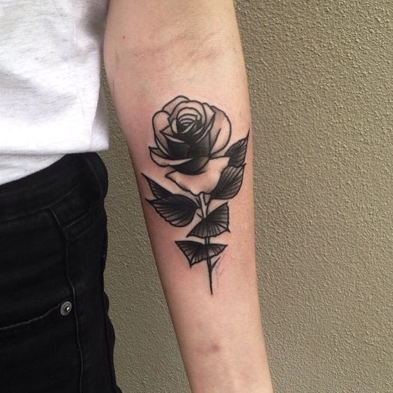 Rose tattoo on forearm for men