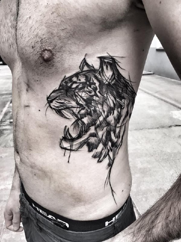 Tattoo of a tiger on the side for men