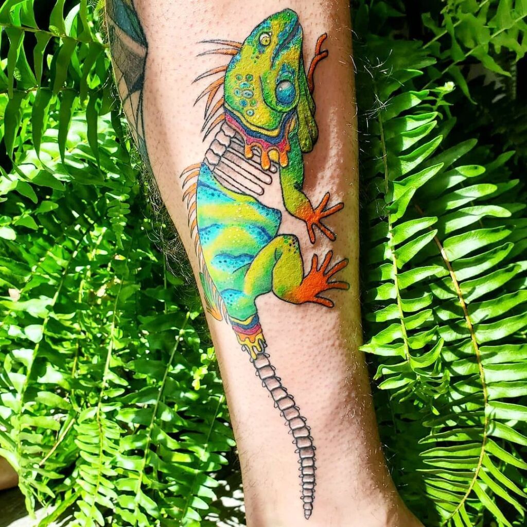 Tattoo of an iguana on the forearm for men