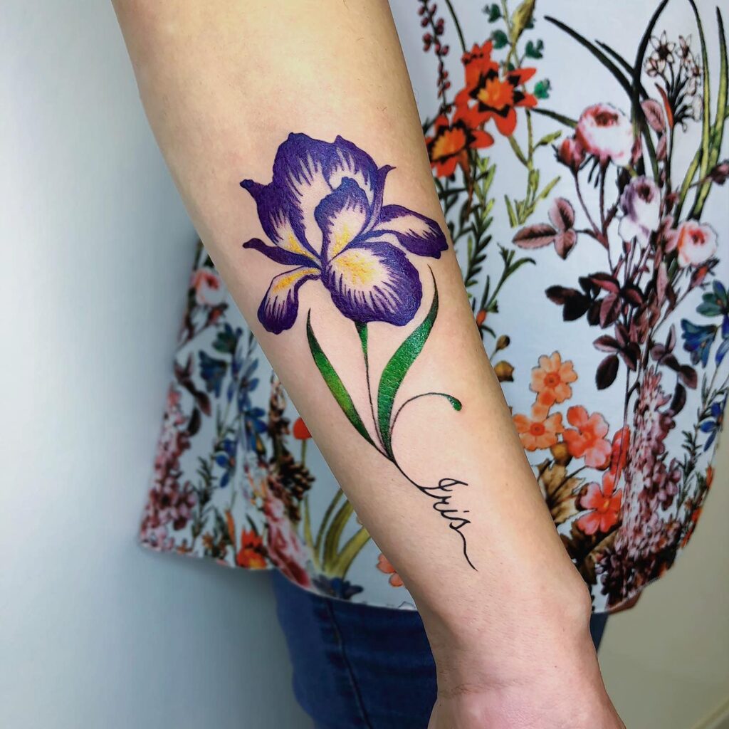 Color iris tattoo on the forearm for women