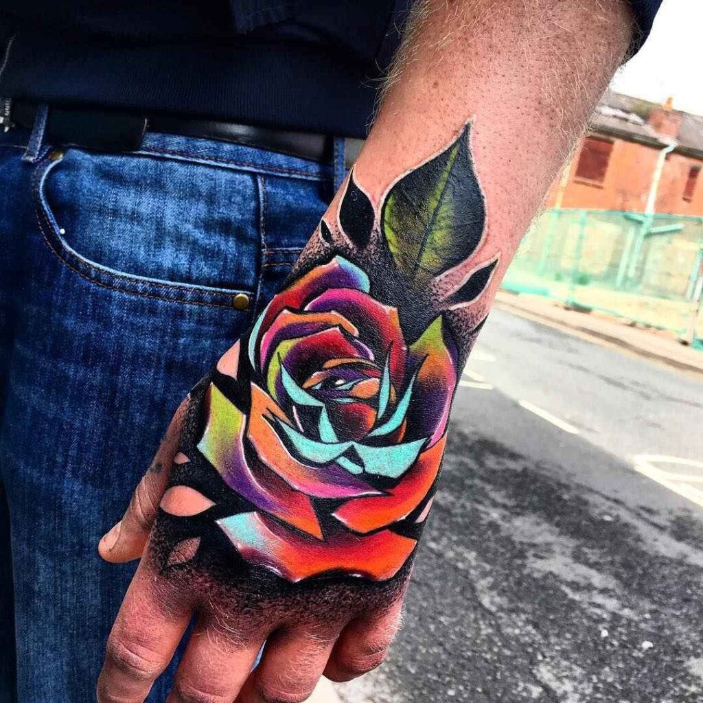 Colorful rose tattoo on the brush for men