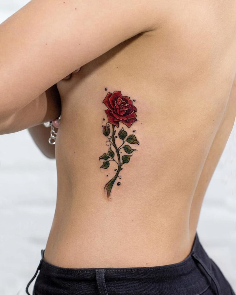 Colorful rose tattoo on the side for women