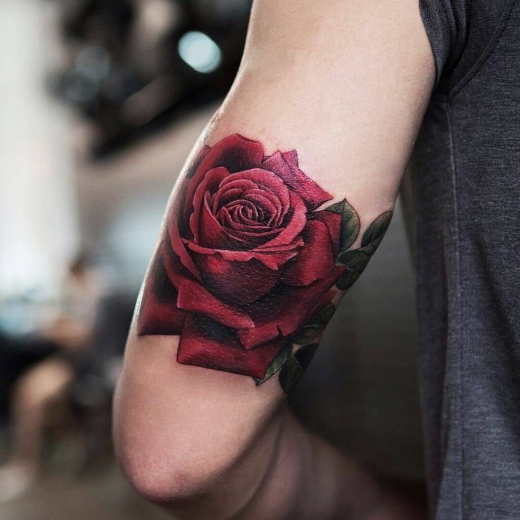 Large rose tattoo on the shoulder for women