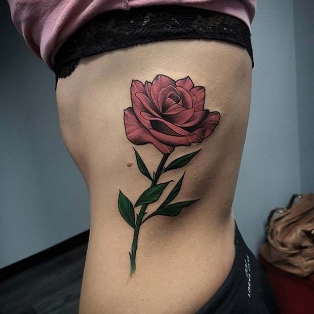 Large rose tattoo on the side for women