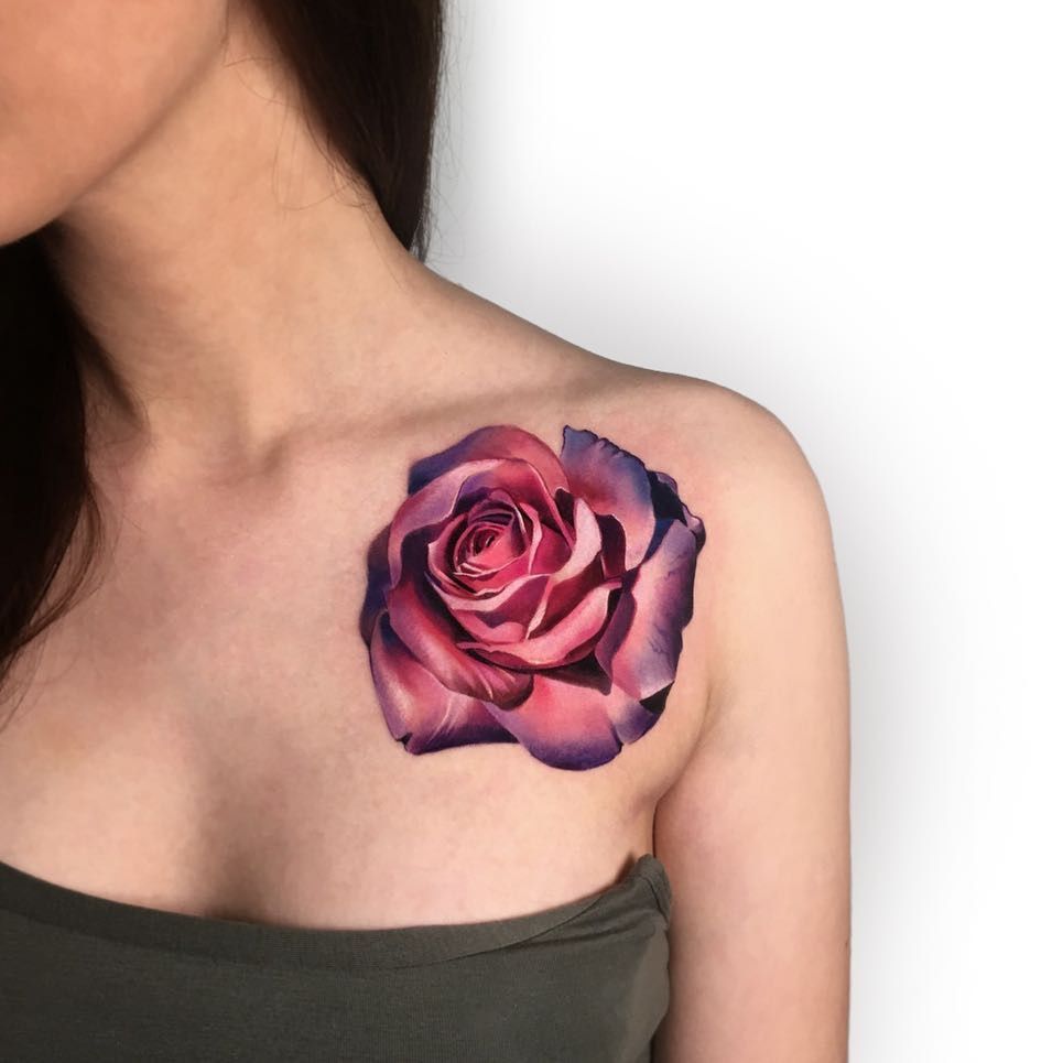 Large rose tattoo on the shoulder for women