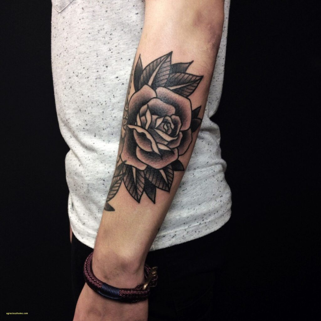 Tattoo of a rose on the forearm for men