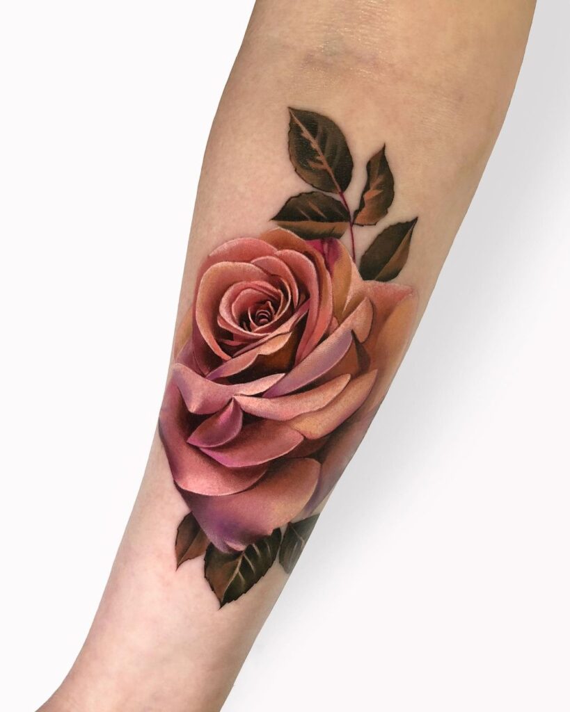 Colorful rose tattoo on the forearm for women