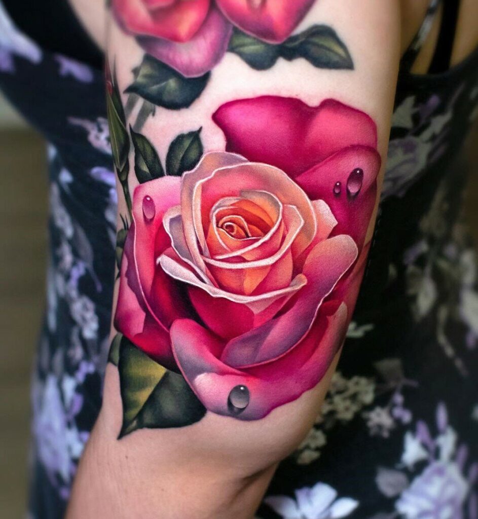 Colorful rose tattoo on the hip for women