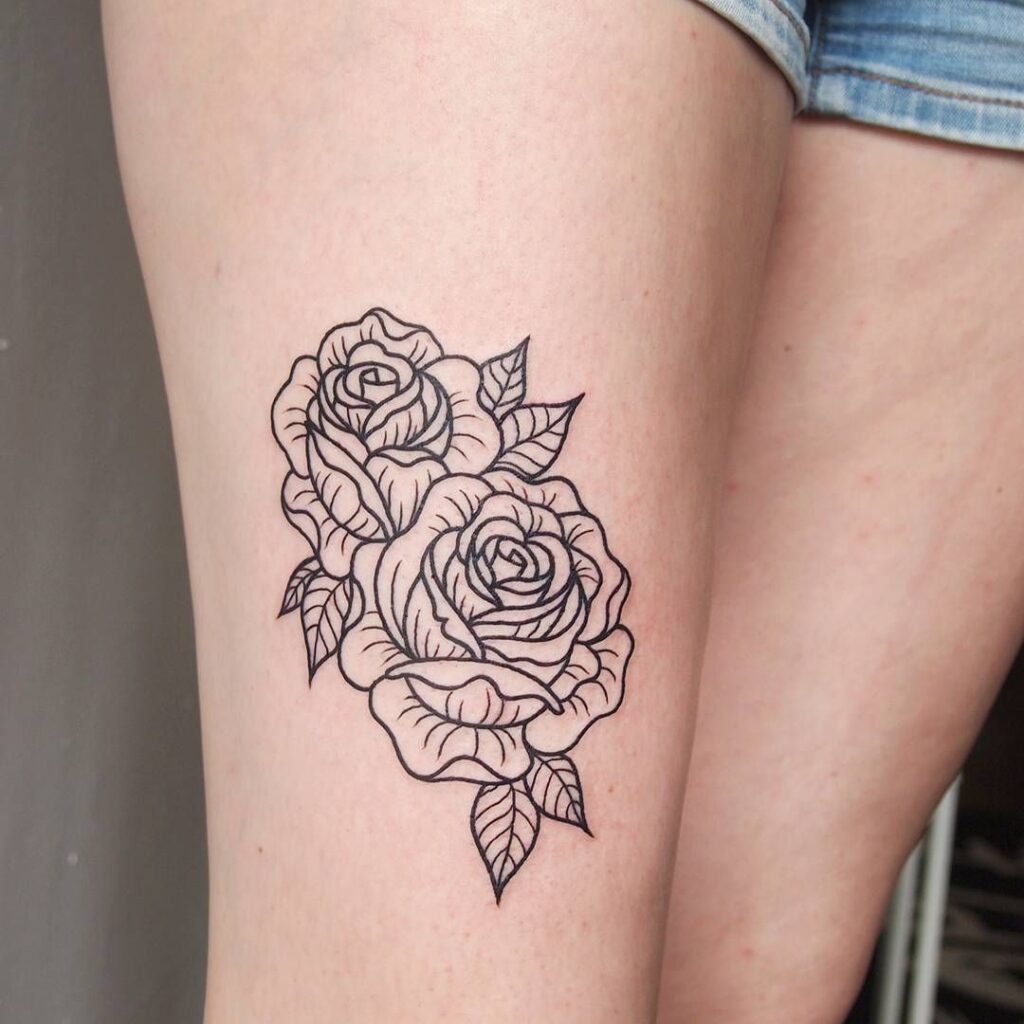 Rose tattoo on the hip for women