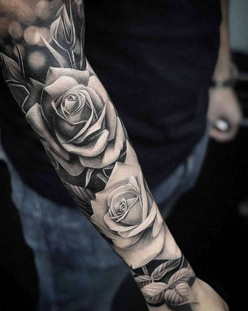 Tattoo of a rose on the forearm for men