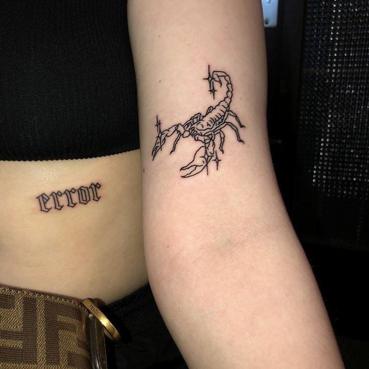 Tattoo of a scorpion on the shoulder for women